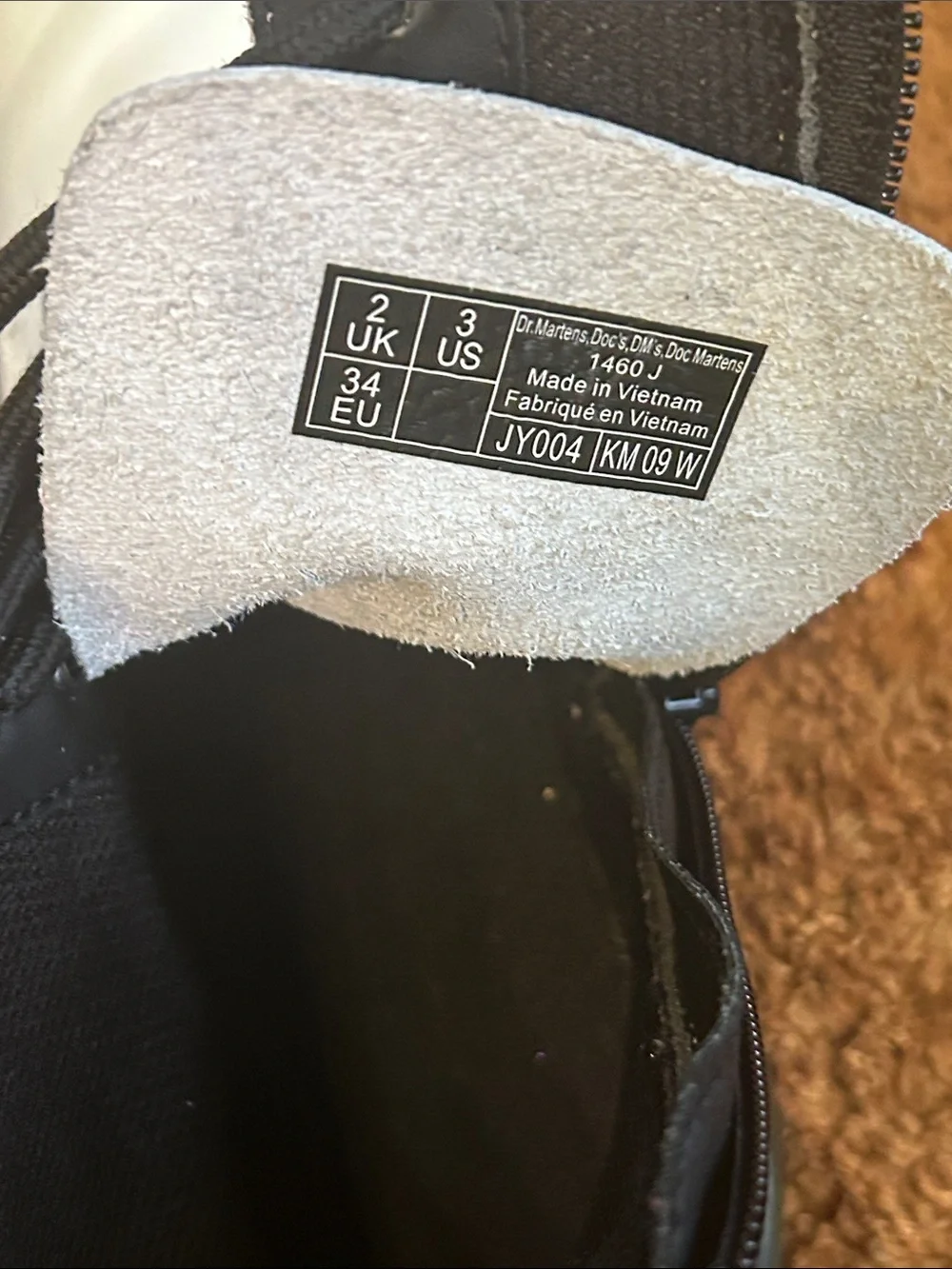 Dr. Martens White Leather Ankle Boots with Black Sole and Trim